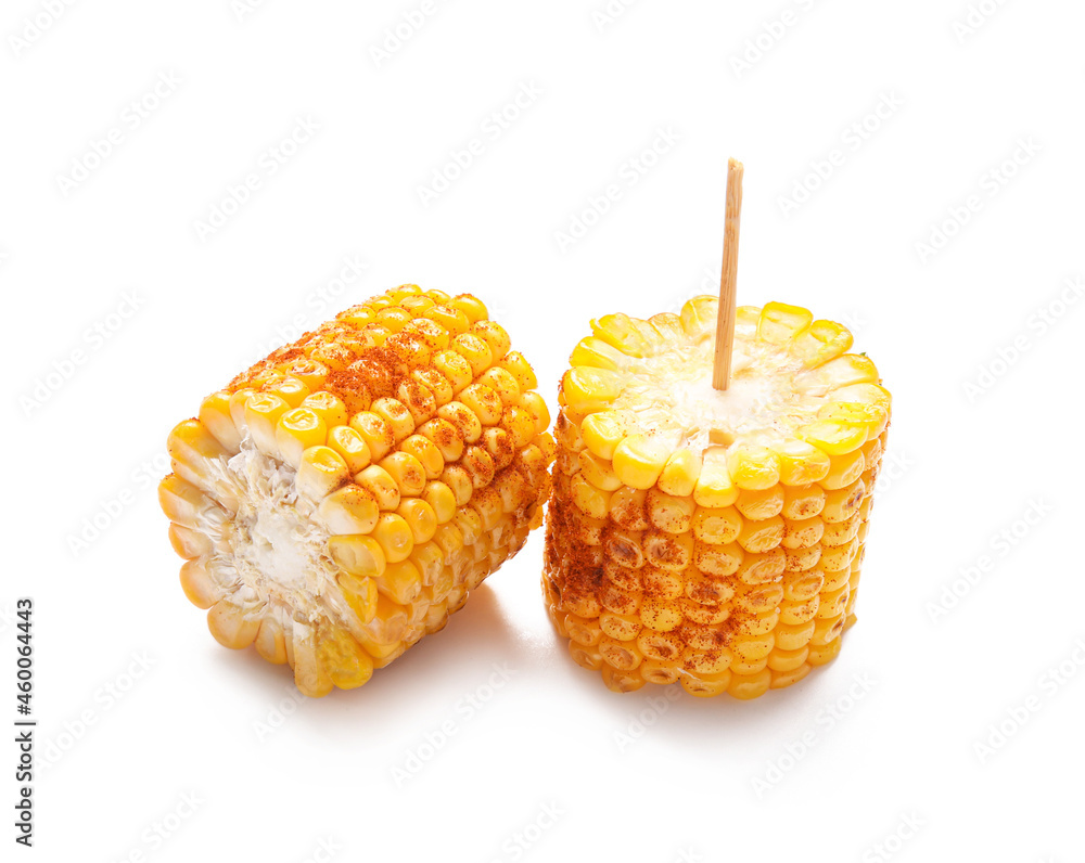 Pieces of delicious grilled Mexican street corn on white background