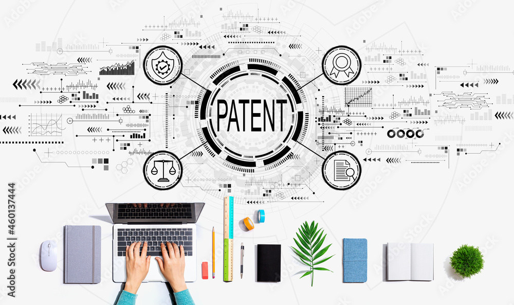 Patent concept with person using a laptop computer