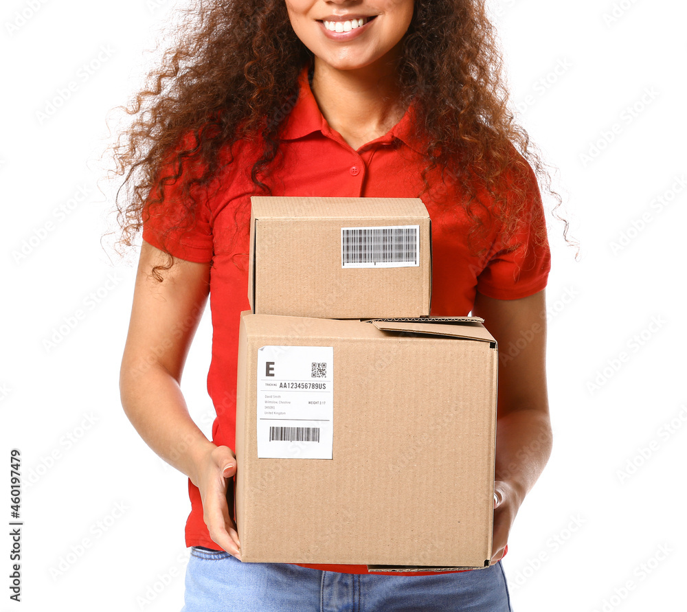 Female African-American courier with parcels on white background