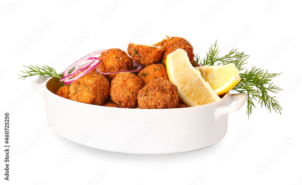 Baking dish with tasty cod cutlets on white background