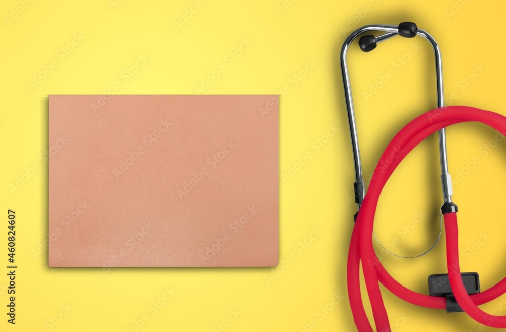 Medical concept. A card with stethoscope on the desk