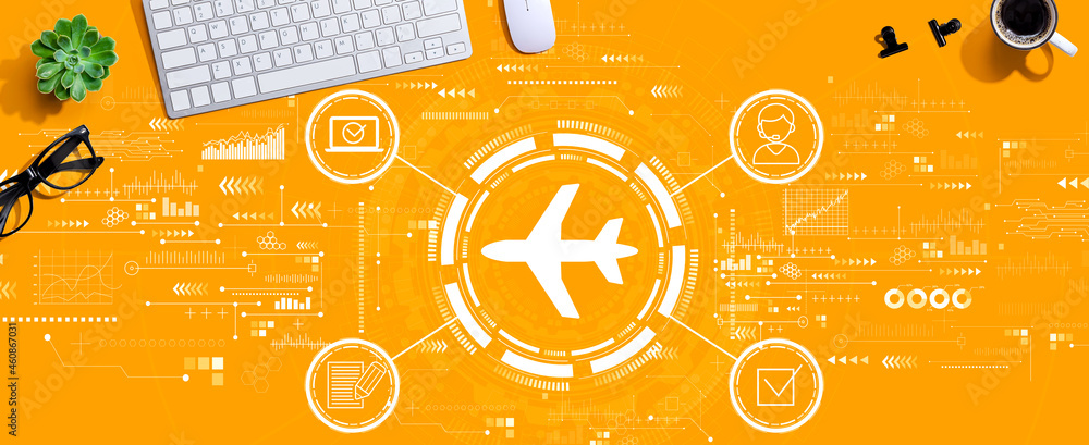 Flight ticket booking concept with a computer keyboard and a mouse