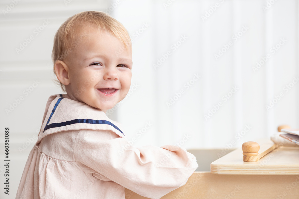 Cute little girl in a sailor dress