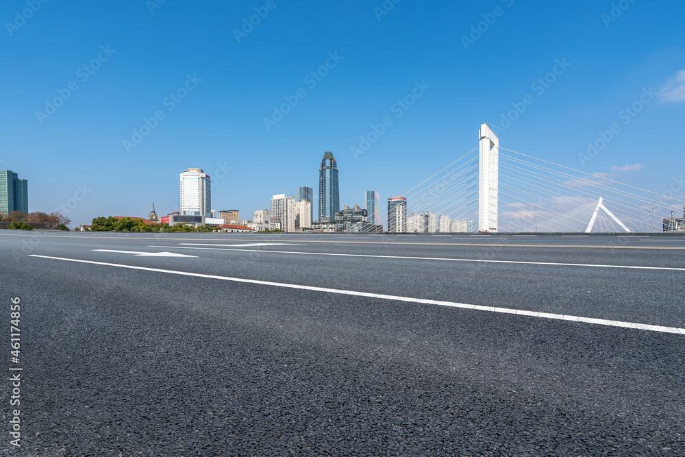 Empty asphalt road and city skyline and building landscape, China.