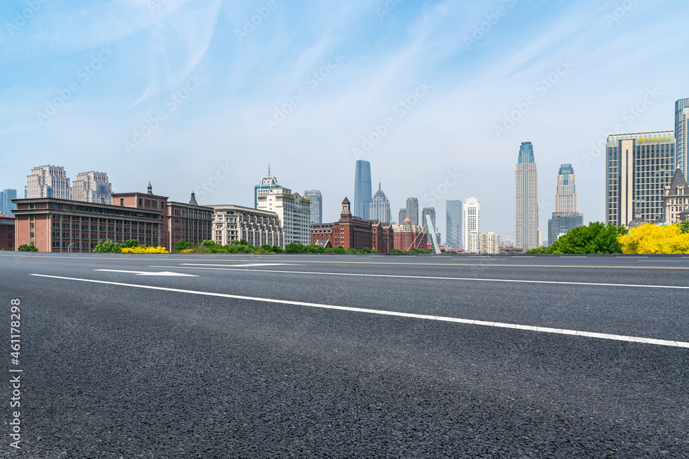 Empty asphalt road and city skyline and building landscape, China.