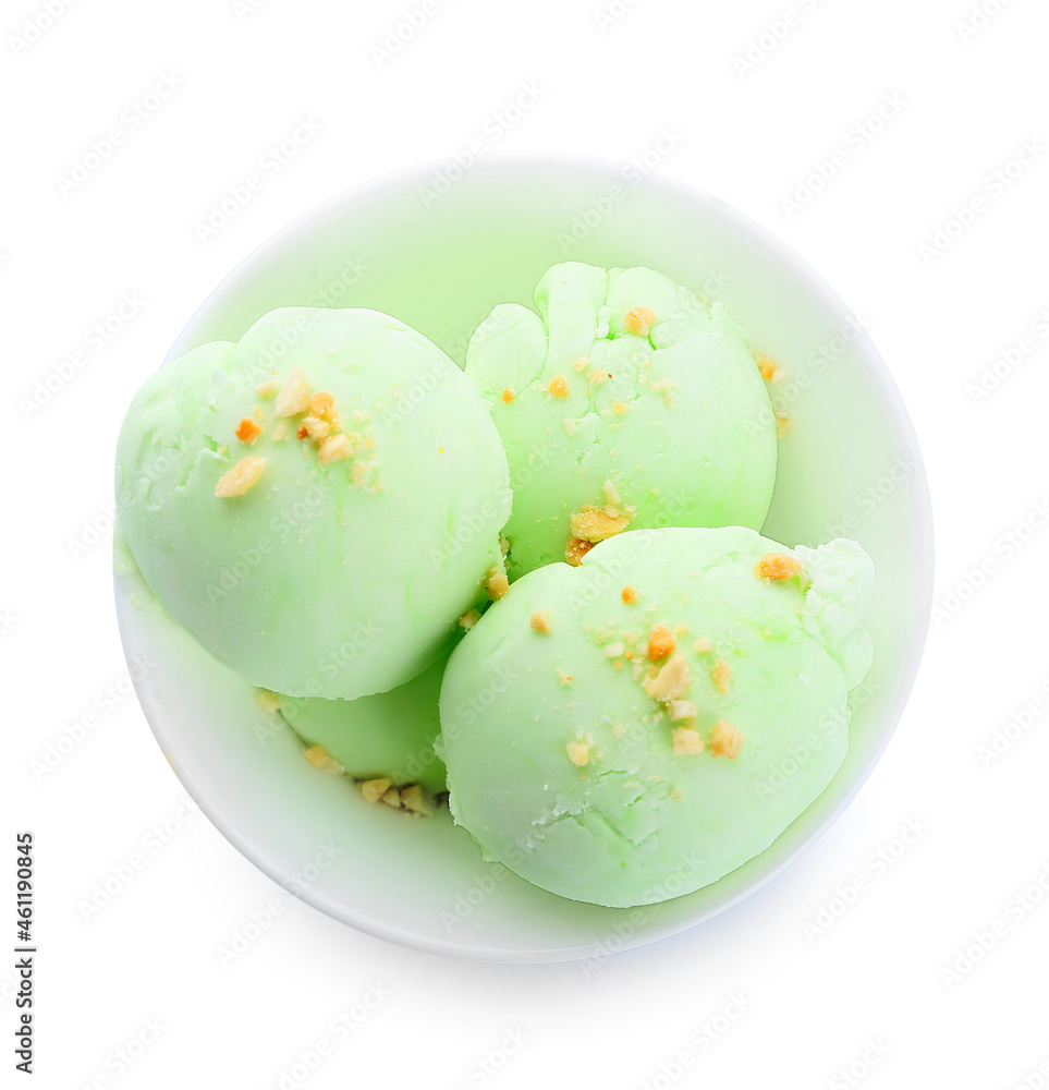 Bowl with delicious pistachio ice cream on white background