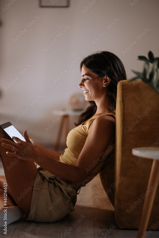 Adult woman, enjoying her hobbies before bed.