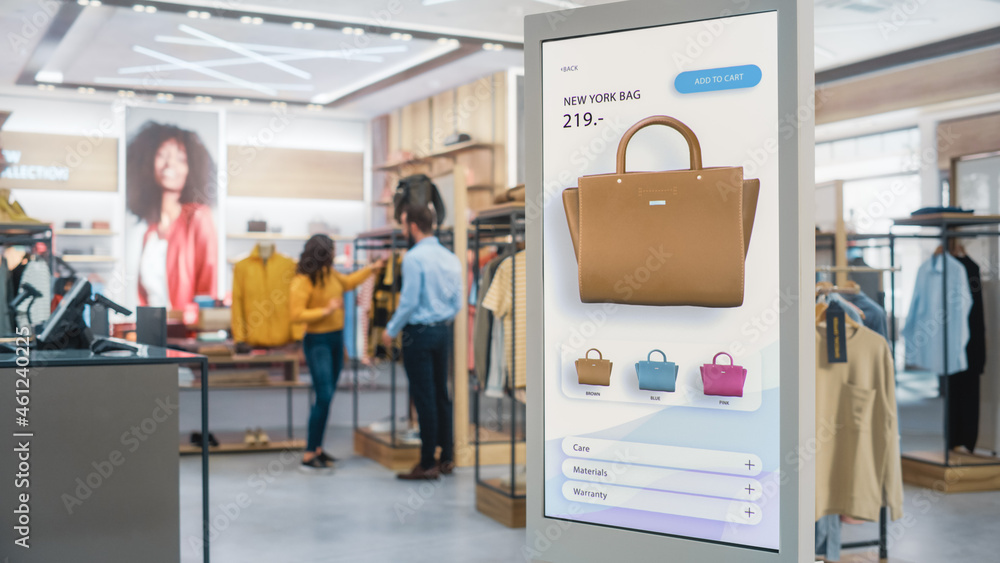 Shot of a Floor-Standing LCD Touch Screen Display with User Interface of Online Clothing Shop Standi