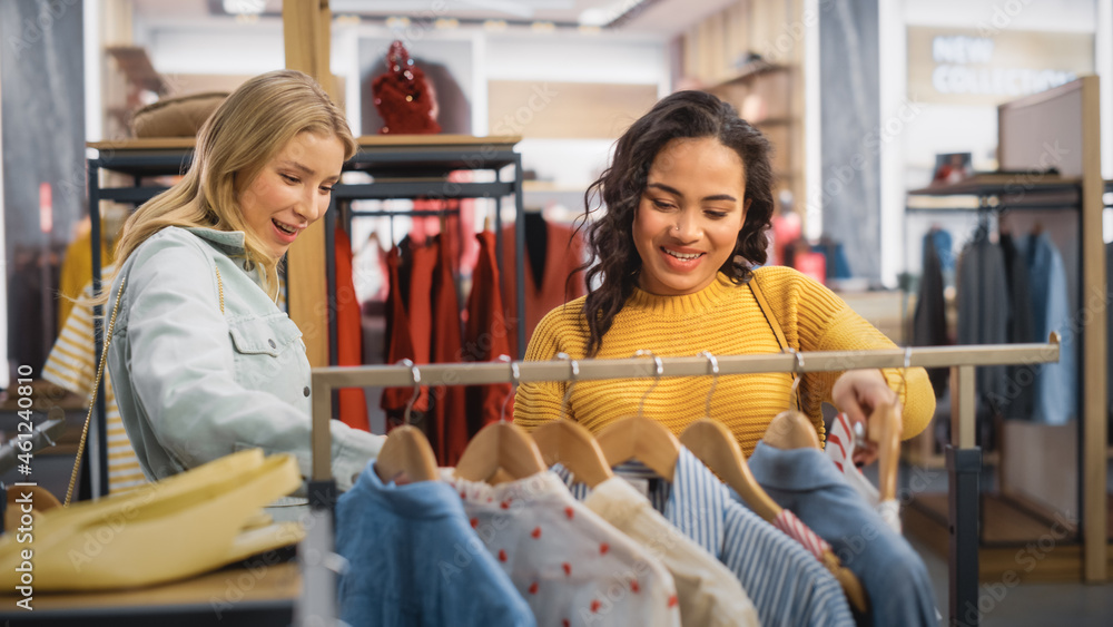 Two Beautiful Female Friends Shopping in Clothing Store, Choosing Stylish Clothes, Picking Dress, Bl