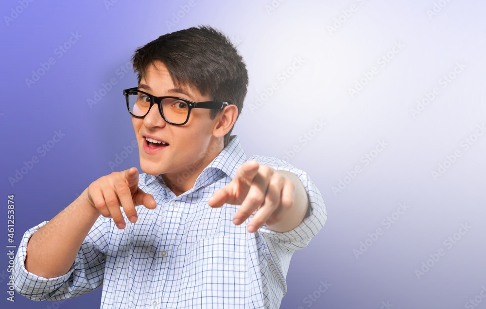 Portrait of an excited man smiling and looking at the camera