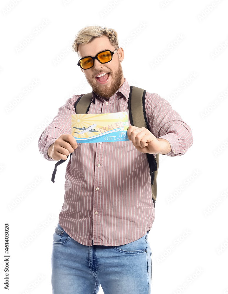 Male tourist with gift voucher on white background