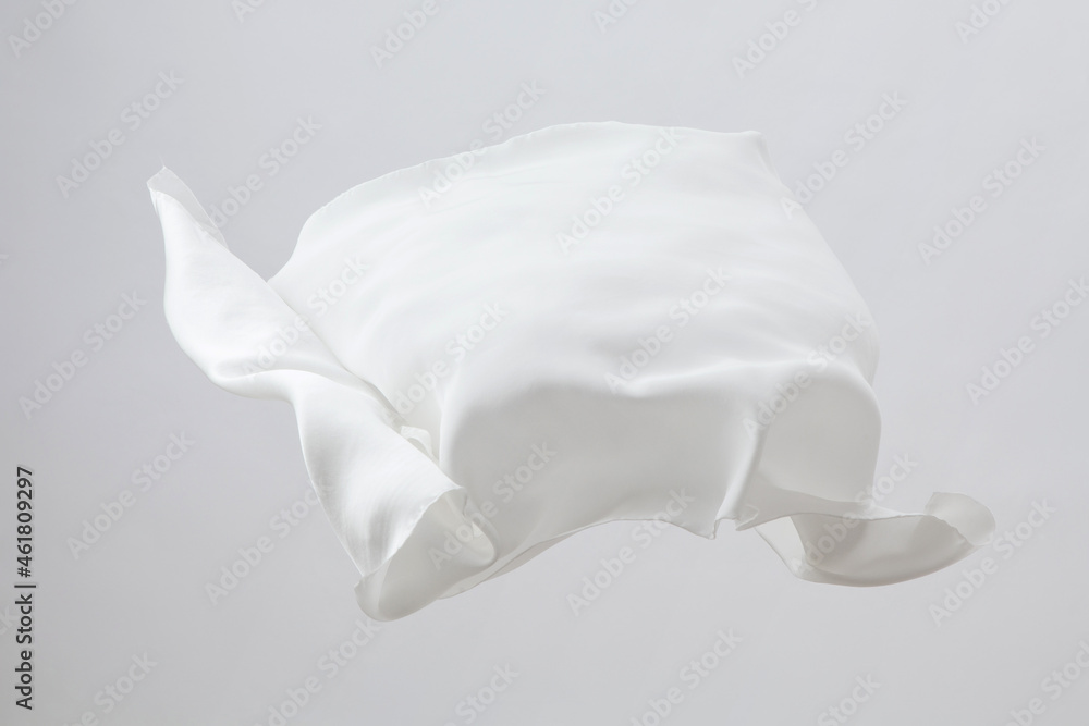 fabric silk flowing isolated on gray background.