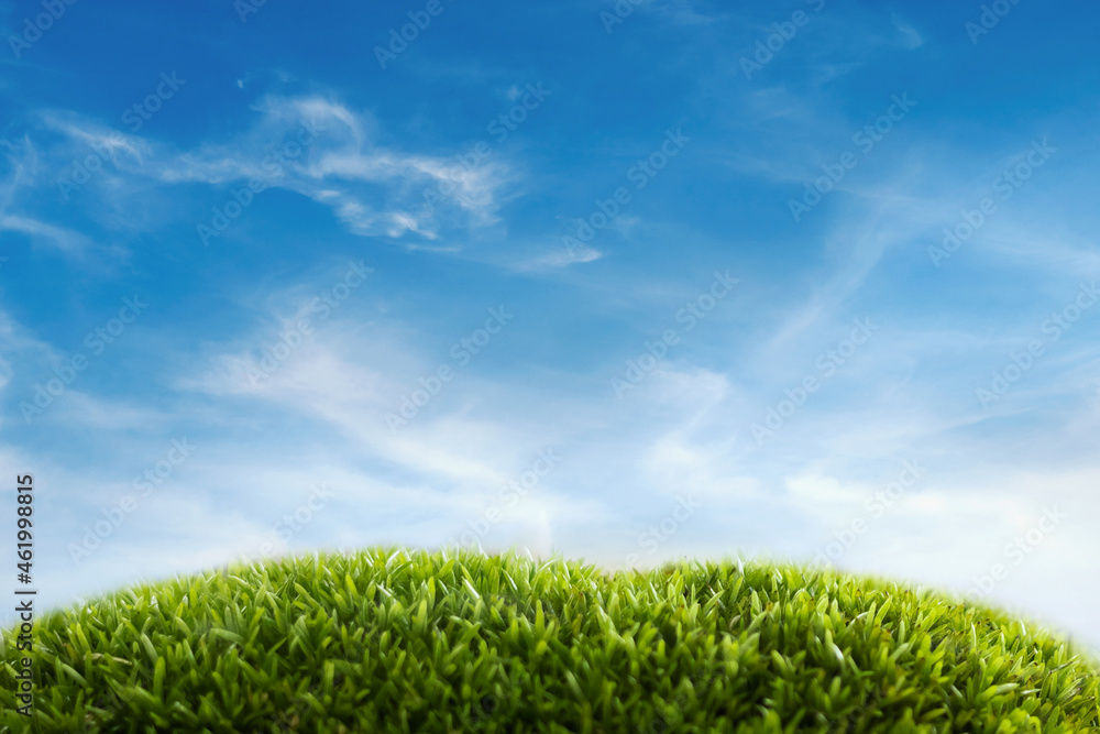 green grass field with blue sky ad white cloud. nature landscape background