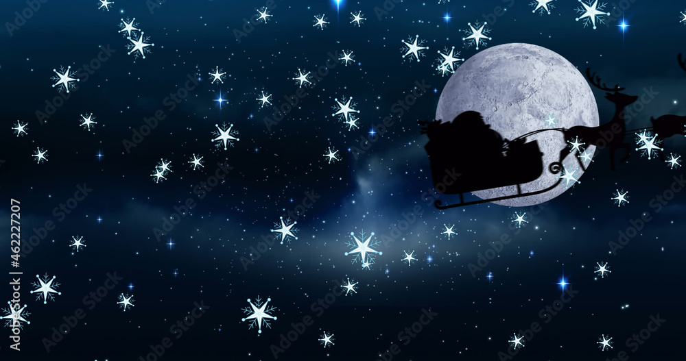 Image of santa claus in sleigh with reindeer at christmas, over snow falling, moon and sky