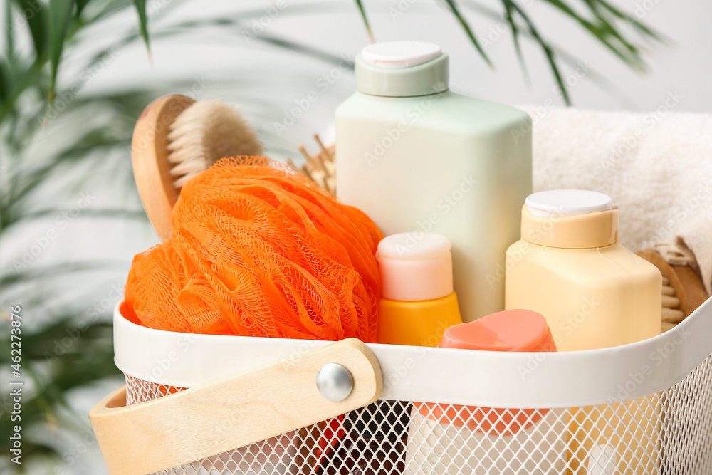 Basket with bath supplies and cosmetics, closeup