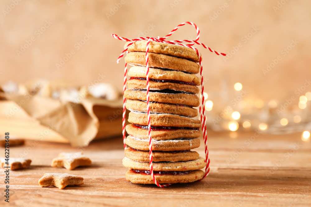 Tasty Linzer cookies on wooden table