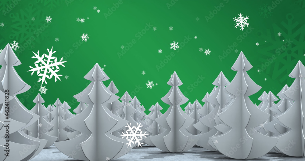 Image of falling snowflakes over fir trees