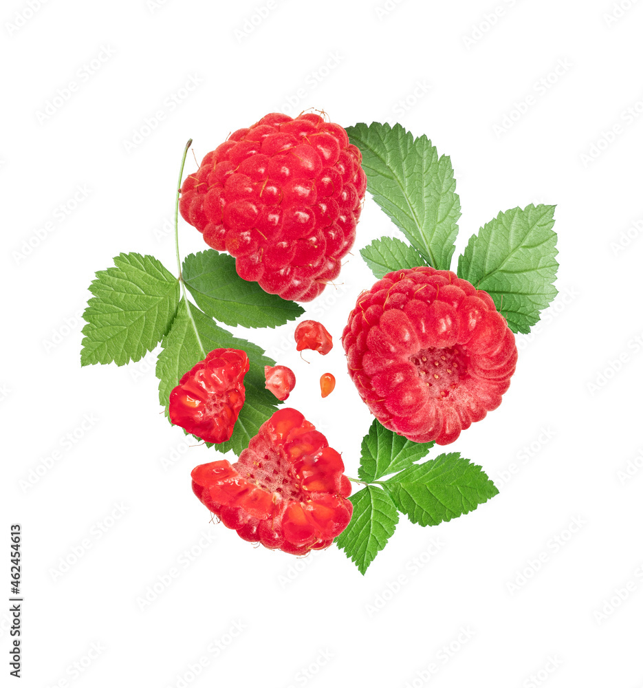 Ripe raspberries with leaves close up isolated on white background