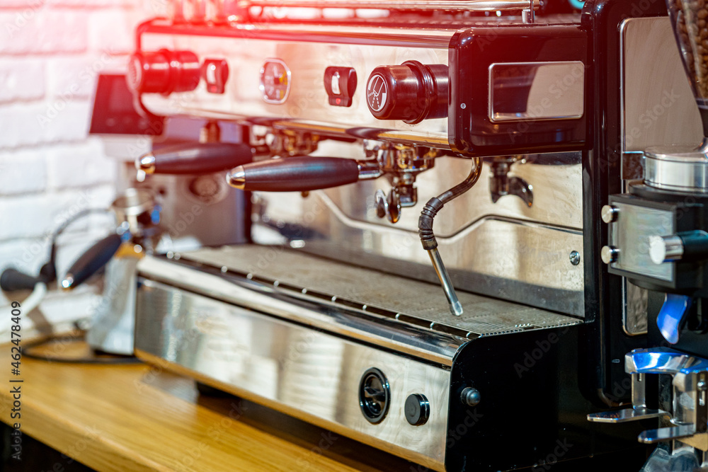 Coffee machine. Making coffee in a coffee machine. Process of preparing coffee in the kitchen. Makin