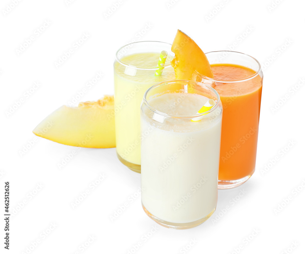 Glasses of tasty melon milkshake on white background