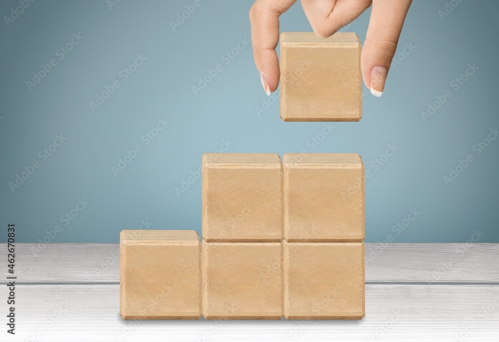 hand stack woods block step on table, Goal and target, success and business target concept,