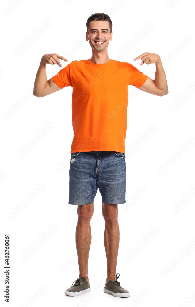 Handsome young man in stylish t-shirt on white background