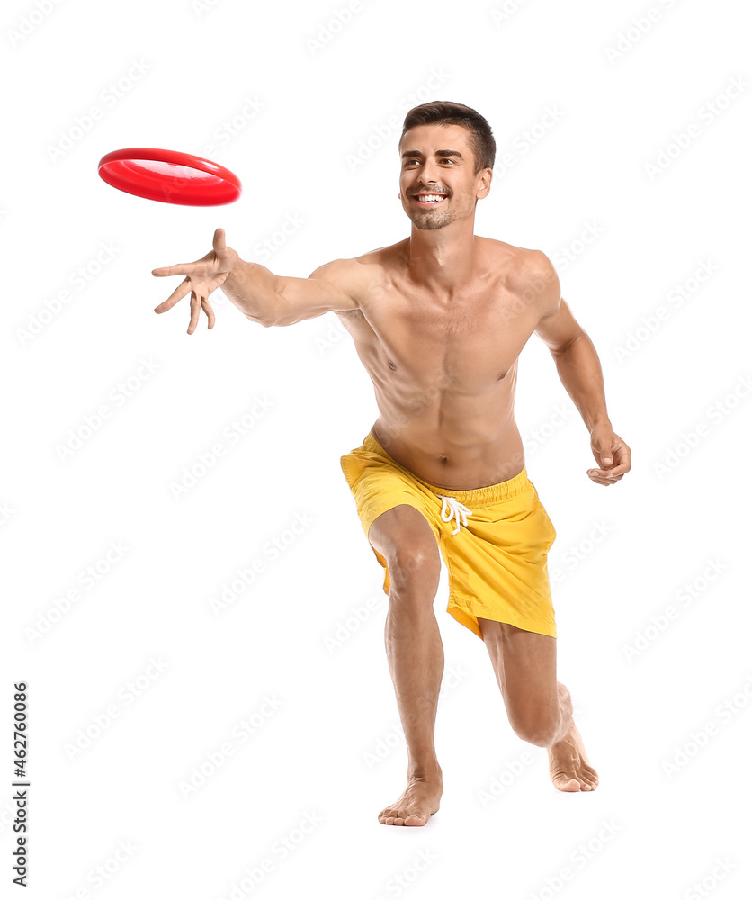 Young man throwing frisbee on white background