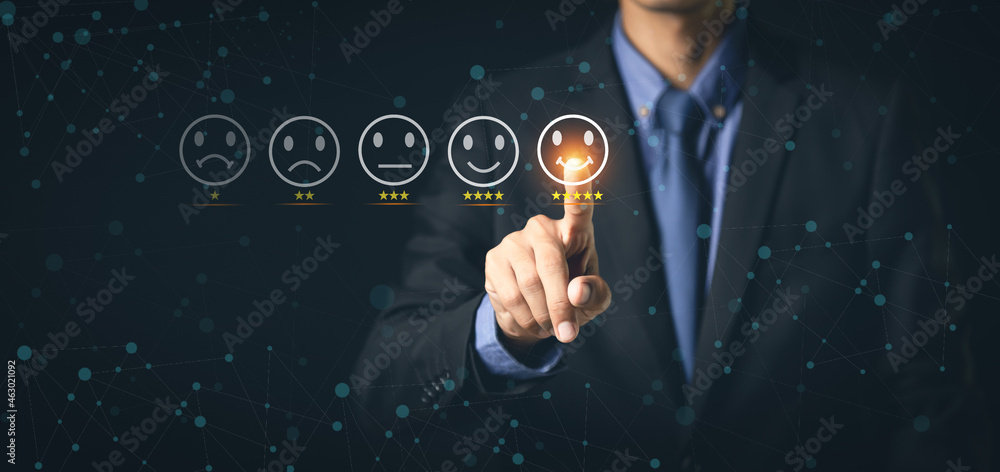 Customer Service and Satisfaction Concept Businessmen touch the virtual screen on happy smiley icons