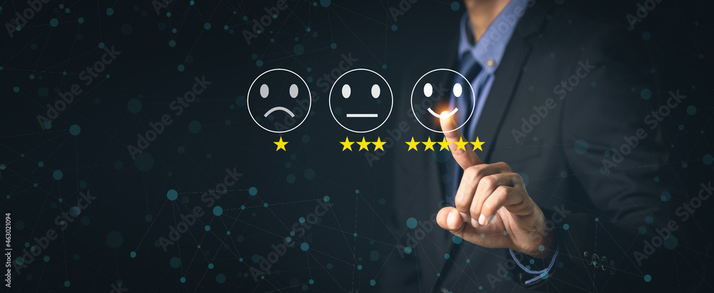 Customer Service and Satisfaction Concept Businessmen touch the virtual screen on happy smiley icons