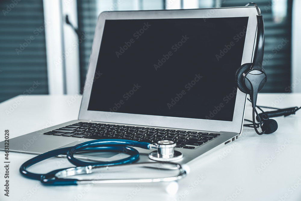 Headset and doctor equipment at clinic ready for actively support for patient by online video call .