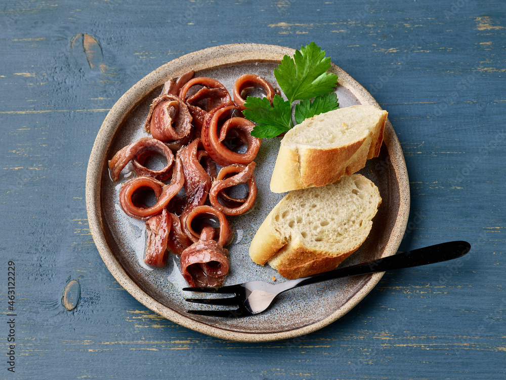 plate of canned anchovy fillets