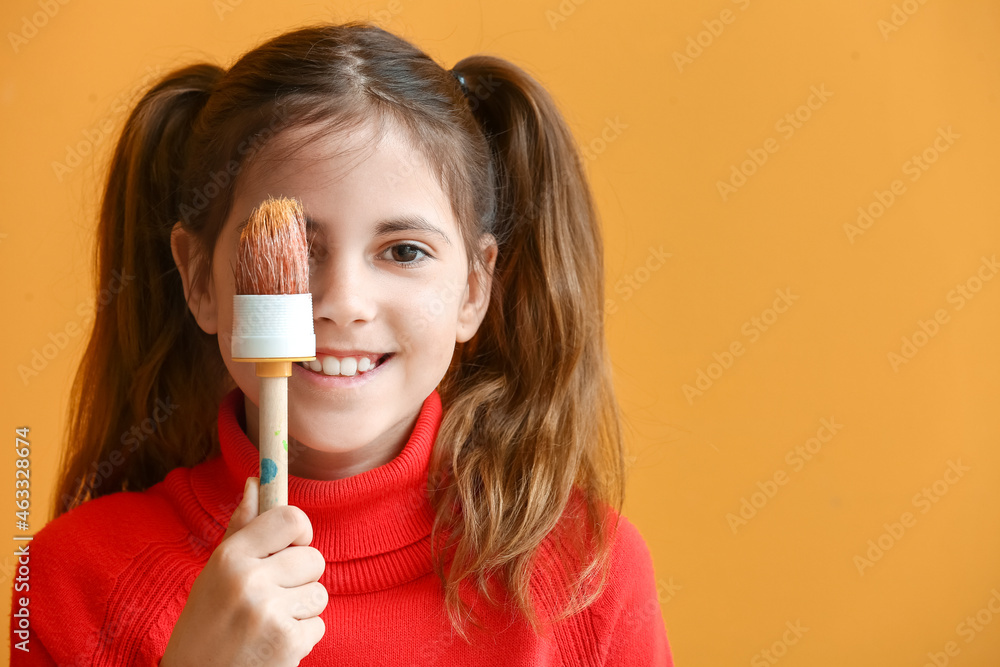 Cute little painter on color background