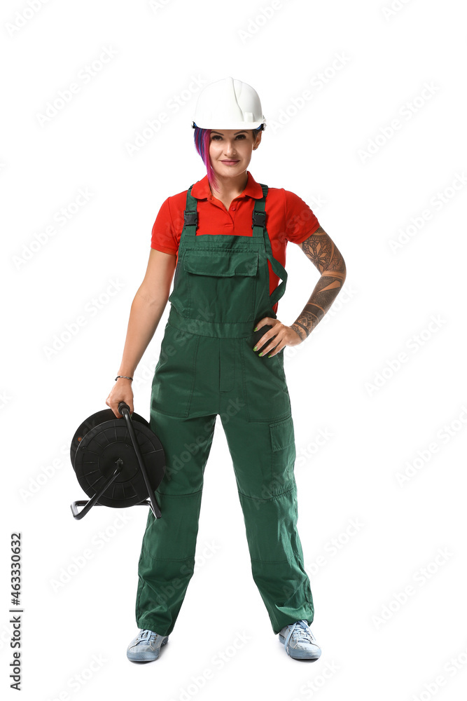 Female electrician with cables on white background