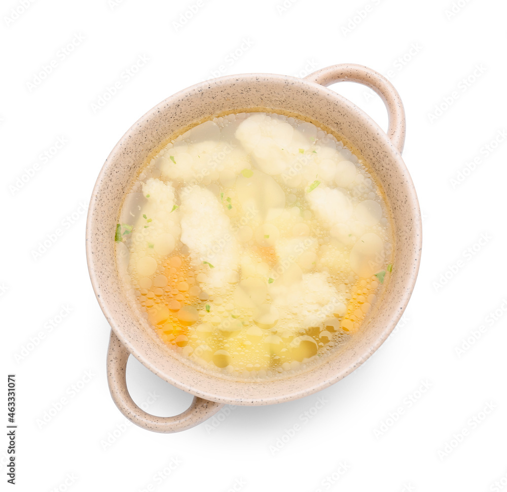 Pot with tasty dumpling soup isolated on white background