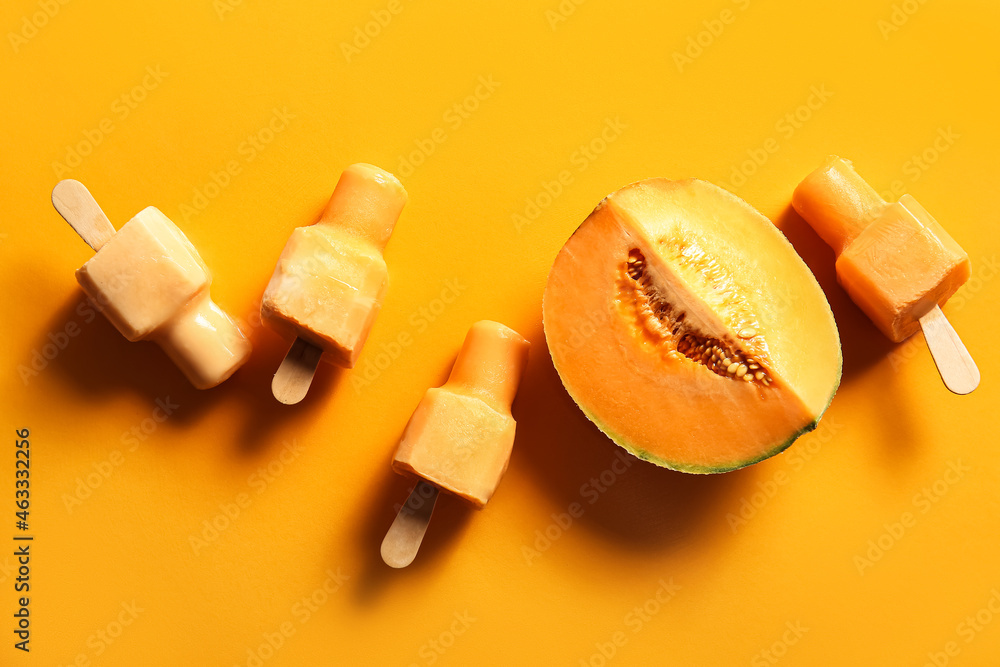 Tasty melon popsicles on color background