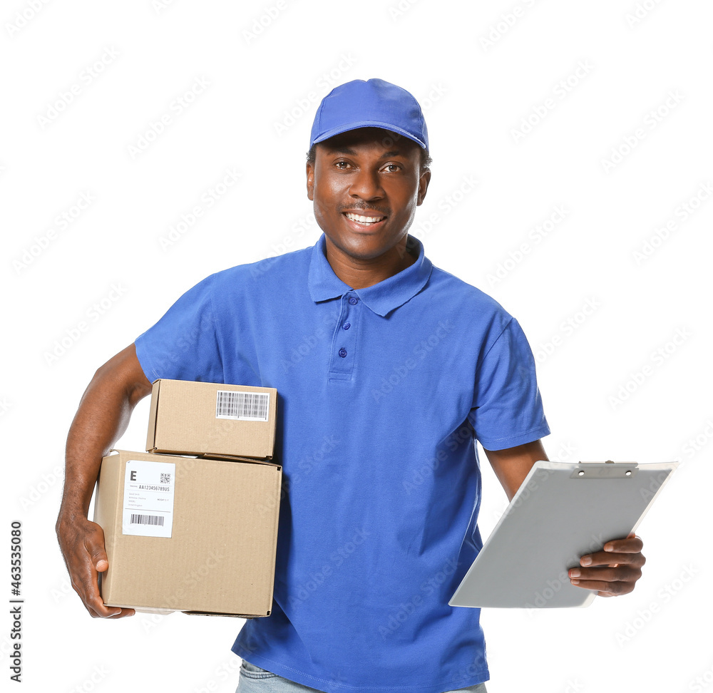 African-American delivery man with parcels on white background