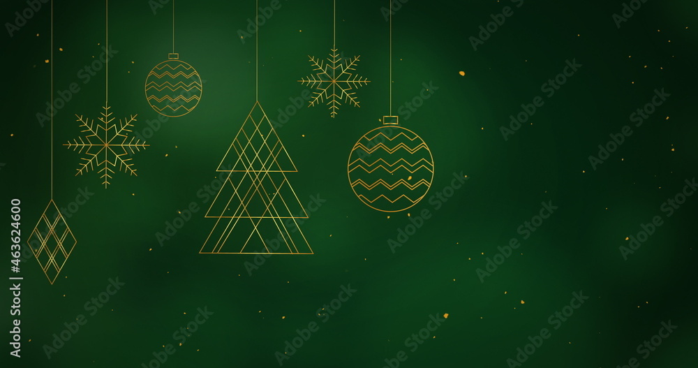 Christmas decorations hanging against green background