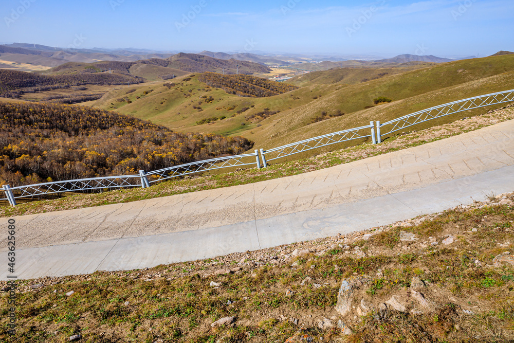 Empty road and mountain natural landscape in autumn season.Road and mountain background.