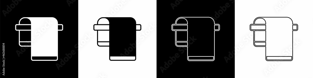 将毛巾挂在衣架上，图标在黑白背景上隔离。浴室毛巾图标。矢量