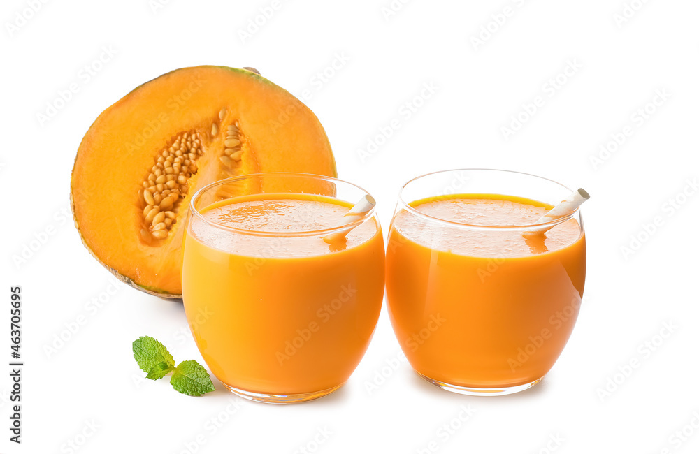 Glasses of tasty melon milkshake on white background