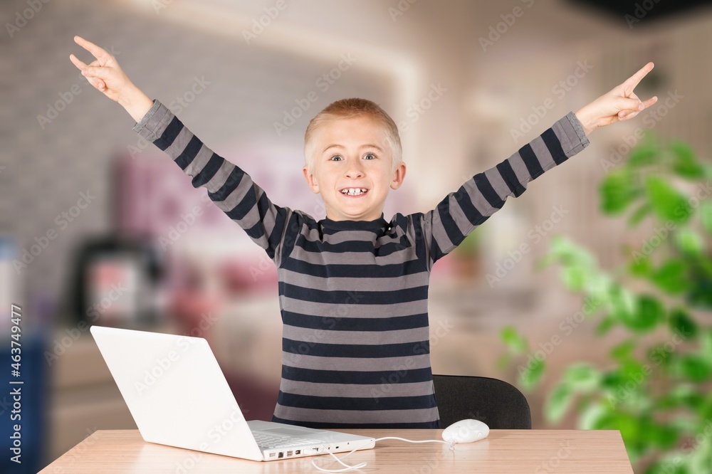 excited primary school student during online class