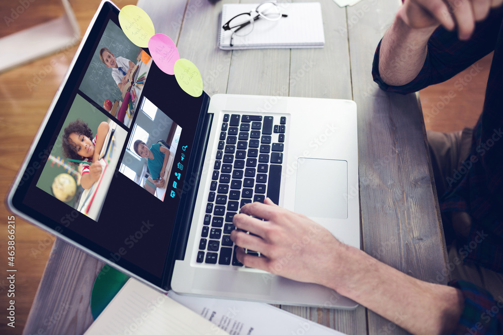 Hands of man using laptop for video call, with smiling diverse elementary school pupils on screen