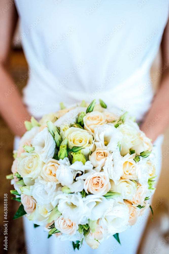 Bride holding bouguet of flowers