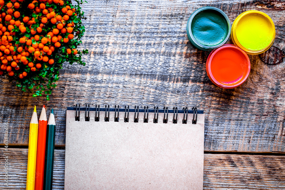 hobby painting - workplace with colored pencils, gouache jars