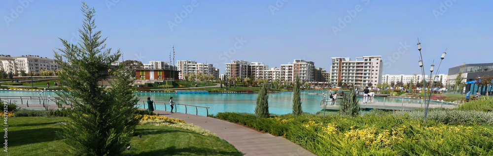 Panoramic view of Tashkent city park and lake.