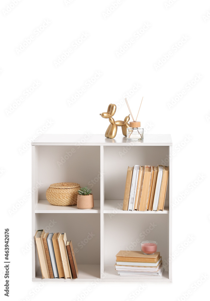 Modern bookcase with decor on white background