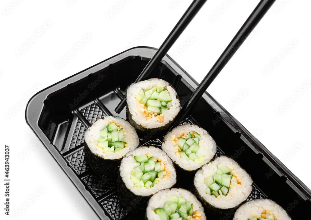 Set of delicious sushi rolls on white background