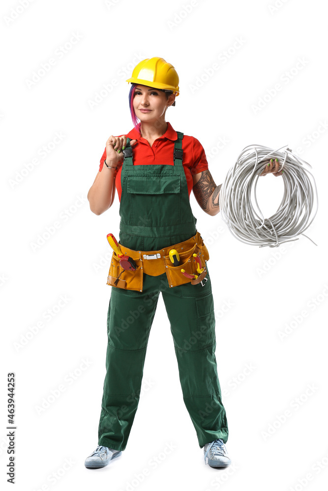 Female electrician with cables on white background