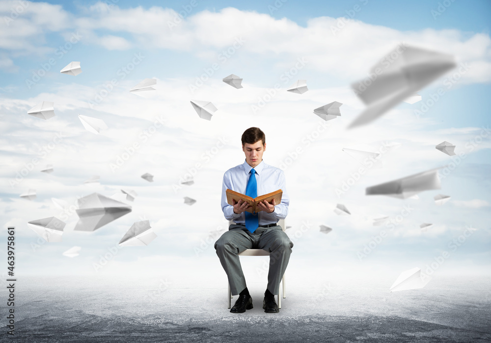 young businessman with book