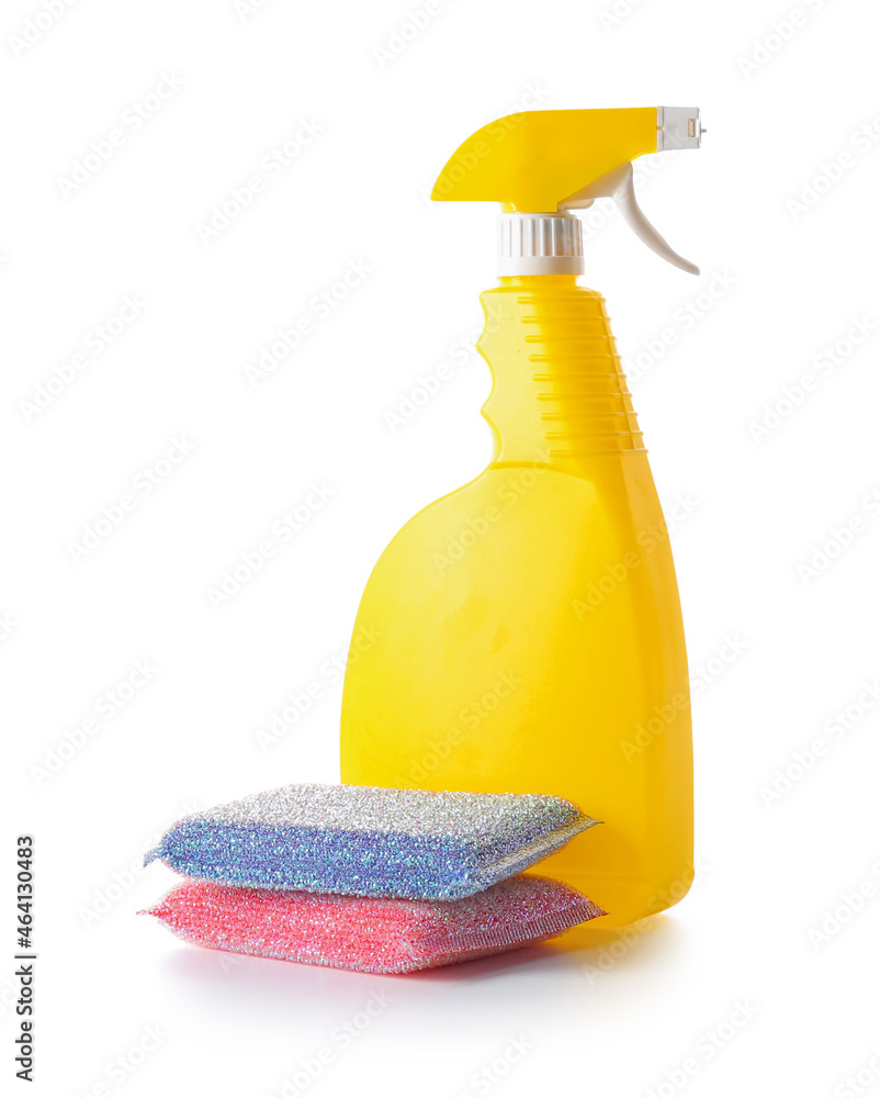 Cleaning sponges and bottle of detergent on white background